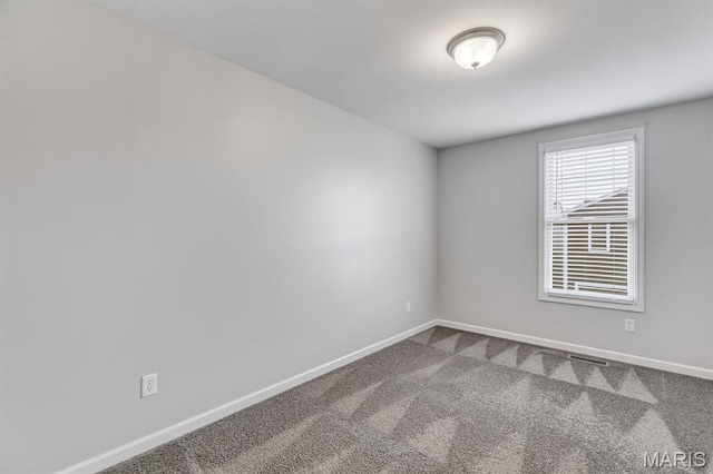 109 Starry Night Way, Saint Charles, MO 63301 - unfurnished room featuring baseboards and dark colored carpet