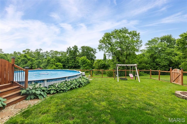 415 Virginia Ave, Cottage Hills, IL 62018 - view of yard with a gate, a playground, and view of scattered trees