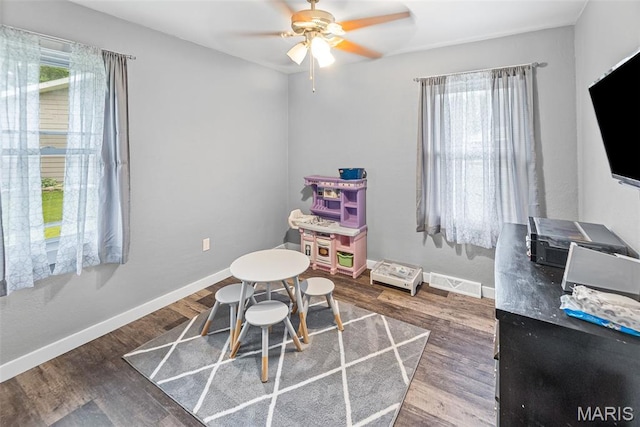 415 Virginia Ave, Cottage Hills, IL 62018 - playroom with a ceiling fan, wood finished floors, and baseboards