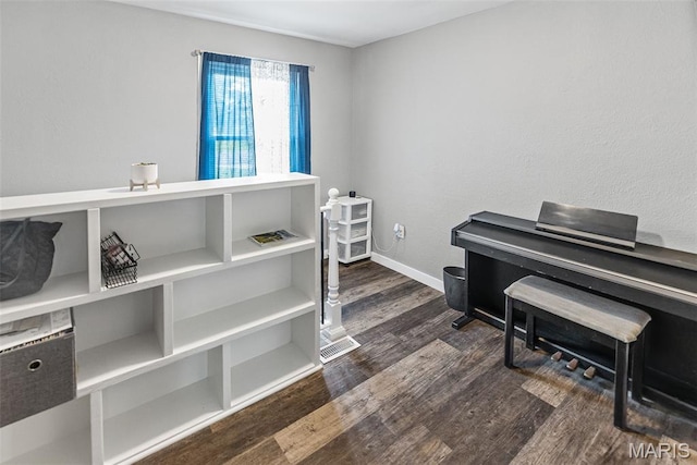 415 Virginia Ave, Cottage Hills, IL 62018 - miscellaneous room with dark wood-style flooring and baseboards