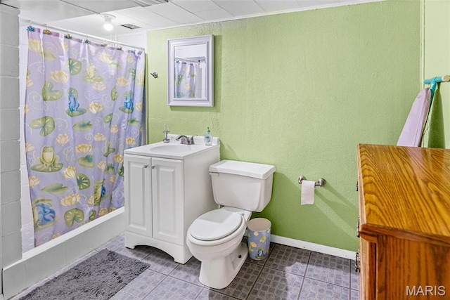 415 Virginia Ave, Cottage Hills, IL 62018 - full bathroom with tile patterned floors, toilet, baseboards, vanity, and shower / bath combo