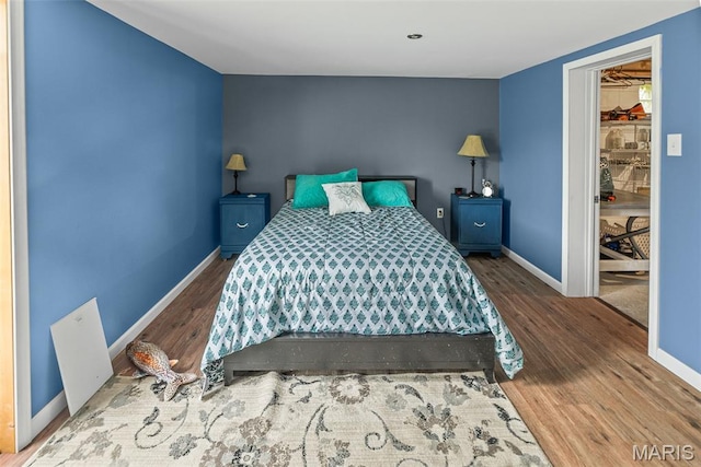 415 Virginia Ave, Cottage Hills, IL 62018 - bedroom featuring baseboards and wood finished floors