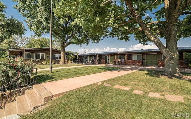 110 Coral Ter Unit 13, Ballwin, MO 63011 - view of green lawn
