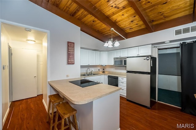 110 Coral Ter Unit 13, Ballwin, MO 63011 - kitchen featuring black appliances, wooden ceiling, light countertops, white cabinets, and a chandelier