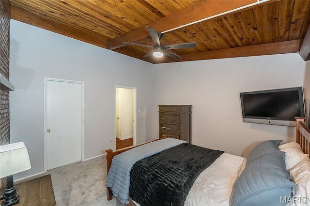 110 Coral Ter Unit 13, Ballwin, MO 63011 - carpeted bedroom featuring wooden ceiling with exposed beams, a brick fireplace, and a ceiling fan
