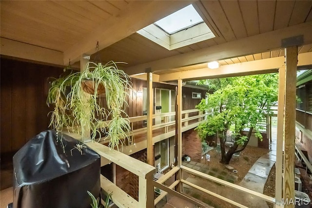 110 Coral Ter Unit 13, Ballwin, MO 63011 - misc room with a skylight, wood ceiling, and wood walls