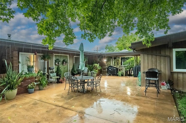 110 Coral Ter Unit 13, Ballwin, MO 63011 - view of patio featuring outdoor dining space