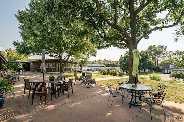110 Coral Ter Unit 13, Ballwin, MO 63011 - view of patio featuring outdoor dining area