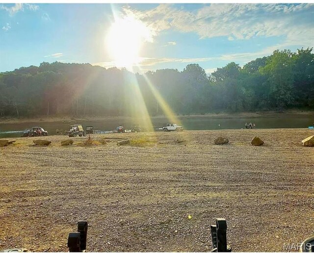 303 Arrowhead Trl, Hermann, MO 65041 - view of mountain backdrop with a nearby body of water