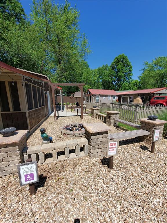 303 Arrowhead Trl, Hermann, MO 65041 - view of yard featuring a fire pit