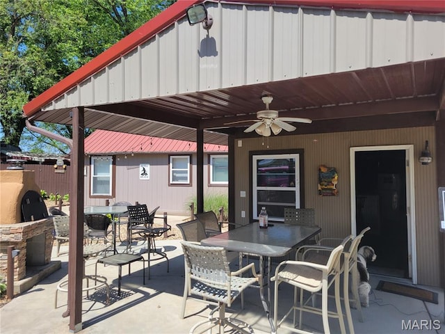 303 Arrowhead Trl, Hermann, MO 65041 - view of patio with outdoor dining area and a ceiling fan