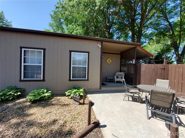 303 Arrowhead Trl, Hermann, MO 65041 - view of patio featuring outdoor dining space