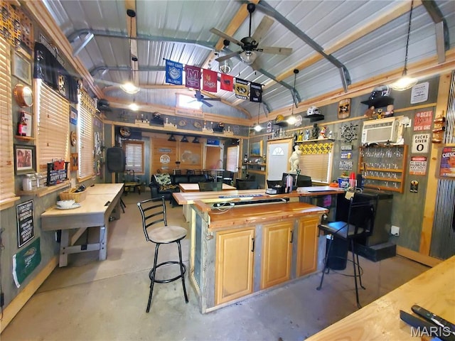 303 Arrowhead Trl, Hermann, MO 65041 - kitchen featuring vaulted ceiling, wood counters, concrete flooring, and ceiling fan