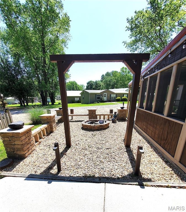 303 Arrowhead Trl, Hermann, MO 65041 - view of patio / terrace with a sunroom
