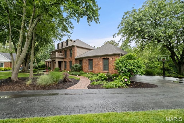 9 Arlington Oaks Ct, Town And Country, MO 63017 - view of front of property with brick siding and a balcony