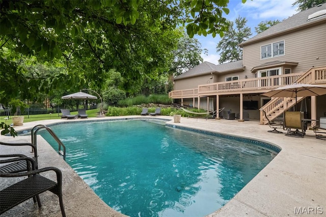 9 Arlington Oaks Ct, Town And Country, MO 63017 - outdoor pool featuring stairs, a deck, and a patio area