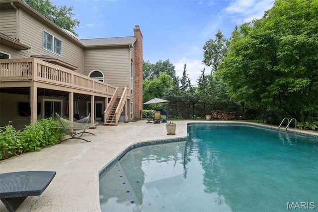 9 Arlington Oaks Ct, Town And Country, MO 63017 - outdoor pool featuring stairs, a patio area, and a deck