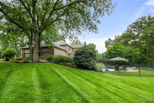 9 Arlington Oaks Ct, Town And Country, MO 63017 - view of yard with an attached garage