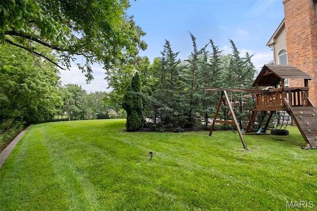 9 Arlington Oaks Ct, Town And Country, MO 63017 - view of green lawn with a playground