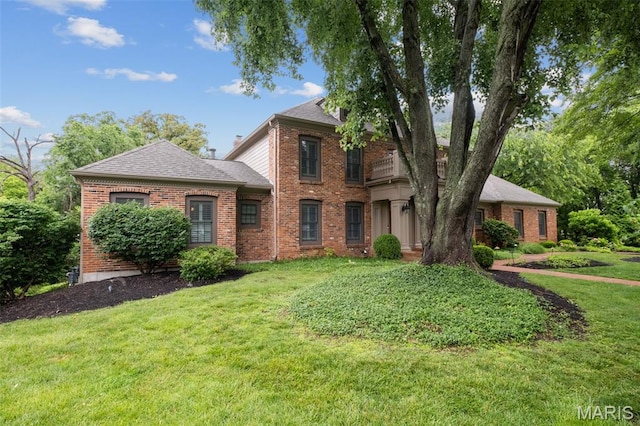 9 Arlington Oaks Ct, Town And Country, MO 63017 - view of front of home featuring brick siding, a front lawn, a balcony, and a shingled roof