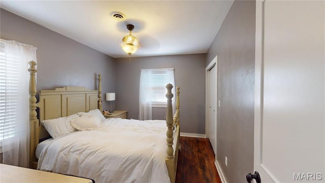 604 N Hena St, Greenville, IL 62246 - bedroom with wood finished floors and baseboards