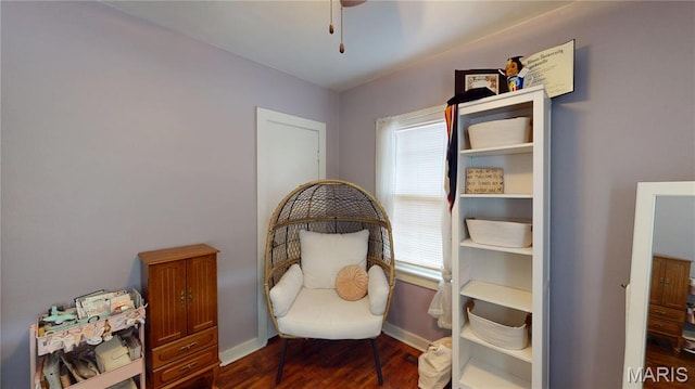 604 N Hena St, Greenville, IL 62246 - living area with dark wood-style floors, baseboards, and ceiling fan