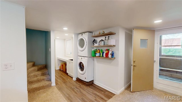 604 N Hena St, Greenville, IL 62246 - laundry area featuring estacked washer and dryer, recessed lighting, baseboards, and light wood-style floors