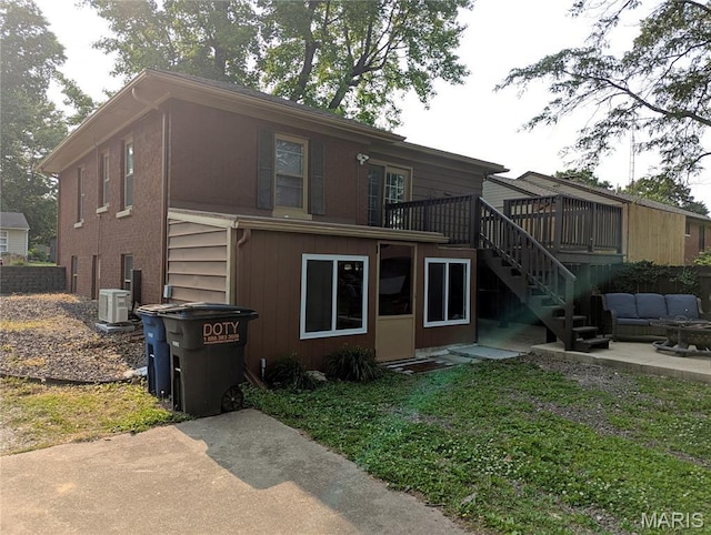604 N Hena St, Greenville, IL 62246 - rear view of property with stairs, a deck, a patio, outdoor lounge area, and central air condition unit