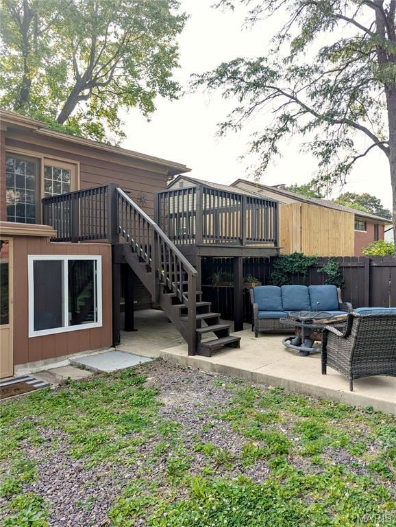 604 N Hena St, Greenville, IL 62246 - rear view of house featuring an outdoor hangout area, stairway, a patio area, and a wooden deck