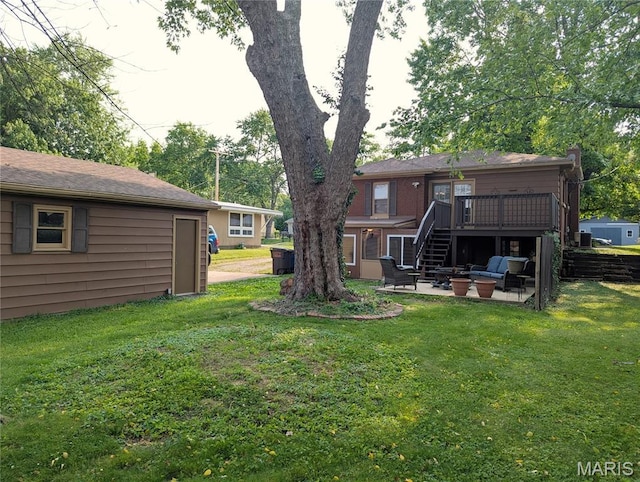 604 N Hena St, Greenville, IL 62246 - view of green lawn featuring a patio area, stairway, and a deck