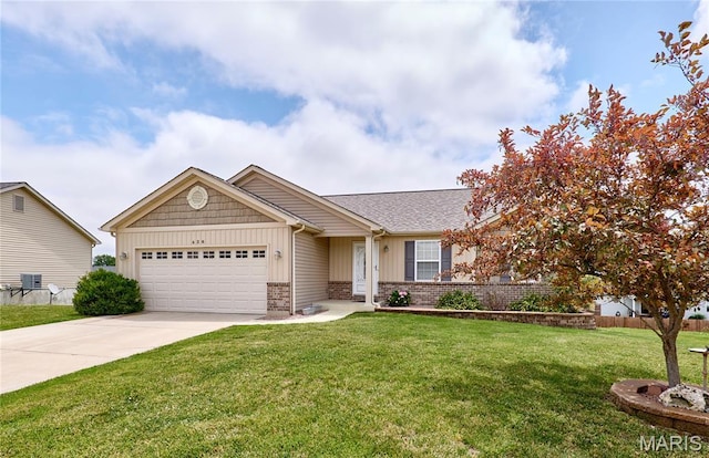 628 Meadowgreen Dr, Troy, MO 63379 - single story home with a garage, brick siding, a front yard, concrete driveway, and board and batten siding