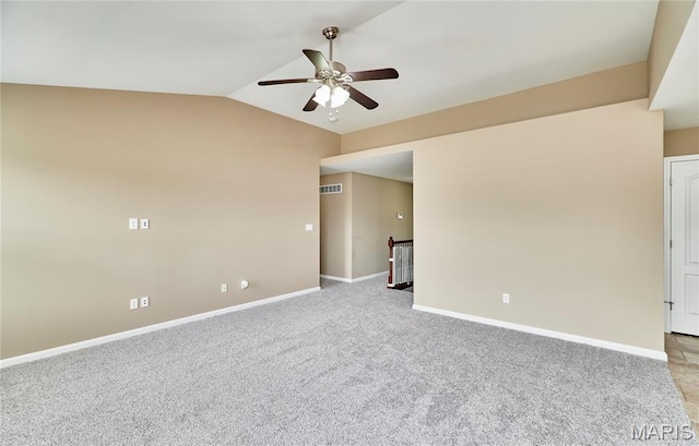 628 Meadowgreen Dr, Troy, MO 63379 - spare room featuring a ceiling fan, light carpet, and lofted ceiling