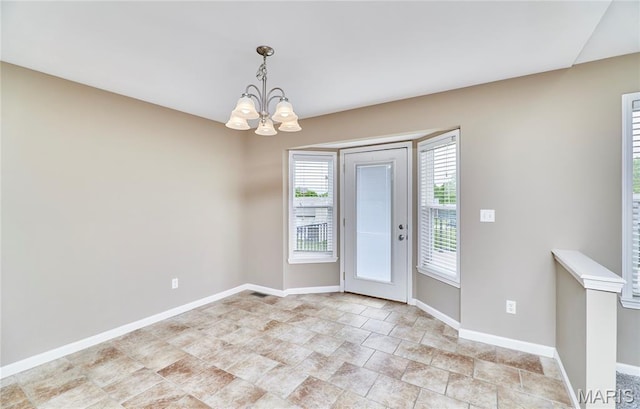 628 Meadowgreen Dr, Troy, MO 63379 - entrance foyer with a chandelier and stone finish floors
