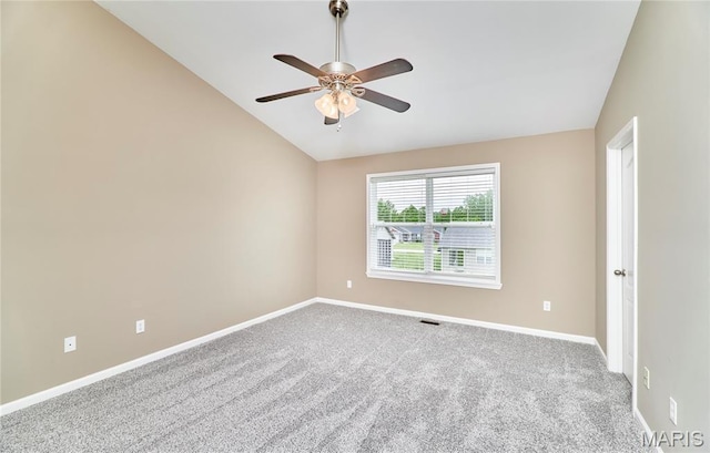628 Meadowgreen Dr, Troy, MO 63379 - carpeted spare room with vaulted ceiling and a ceiling fan