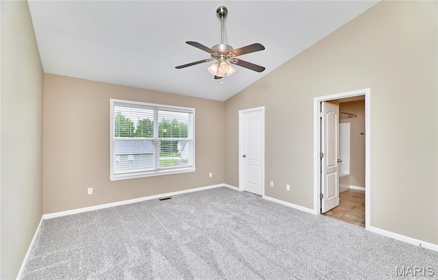 628 Meadowgreen Dr, Troy, MO 63379 - unfurnished bedroom with carpet flooring, vaulted ceiling, connected bathroom, and a ceiling fan