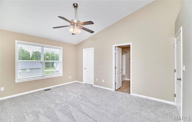 628 Meadowgreen Dr, Troy, MO 63379 - unfurnished bedroom with lofted ceiling, carpet, a ceiling fan, and ensuite bath