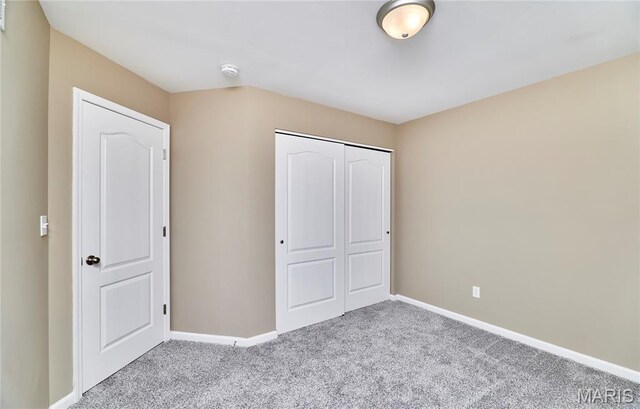 628 Meadowgreen Dr, Troy, MO 63379 - unfurnished bedroom with carpet and a closet