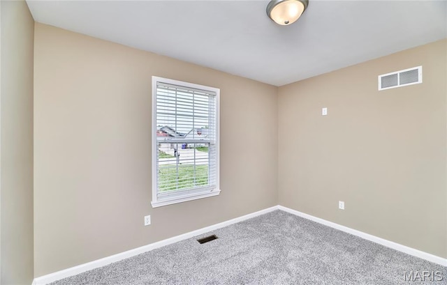 628 Meadowgreen Dr, Troy, MO 63379 - carpeted spare room featuring baseboards