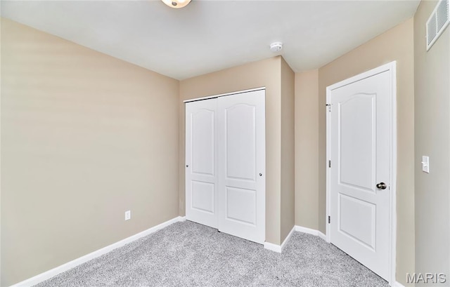 628 Meadowgreen Dr, Troy, MO 63379 - unfurnished bedroom with carpet flooring and a closet