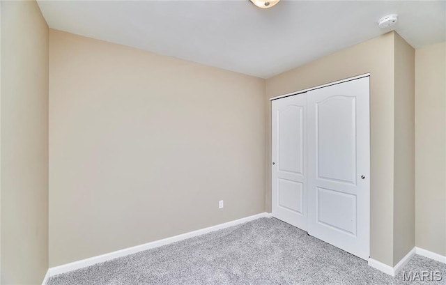 628 Meadowgreen Dr, Troy, MO 63379 - unfurnished bedroom with carpet and a closet
