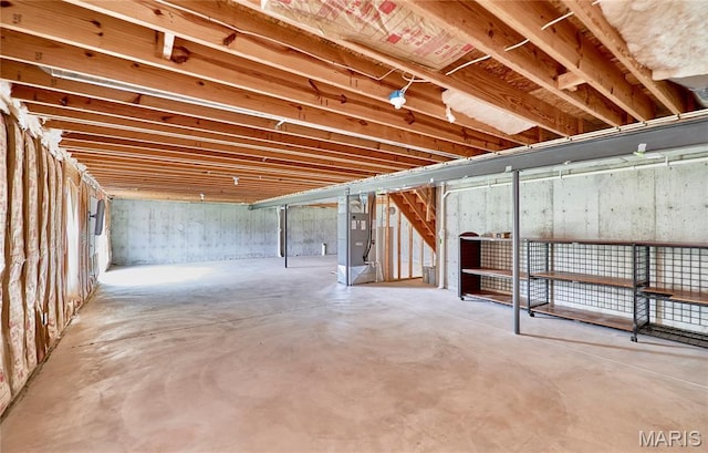 628 Meadowgreen Dr, Troy, MO 63379 - unfinished below grade area featuring stairway and heating unit