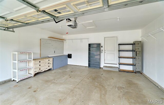 628 Meadowgreen Dr, Troy, MO 63379 - garage with a garage door opener