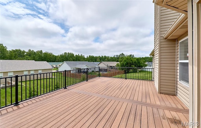 628 Meadowgreen Dr, Troy, MO 63379 - wooden deck featuring a lawn, view of scattered trees, and a residential view