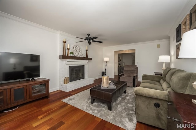 3644 Cinnamon Tree Ln, Oakville, MO 63129 - living area with crown molding, a ceiling fan, wood finished floors, and a fireplace