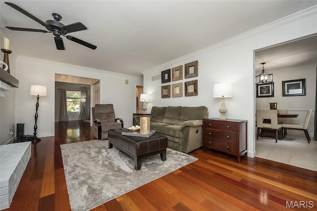 3644 Cinnamon Tree Ln, Oakville, MO 63129 - living room featuring ornamental molding, ceiling fan, and wood finished floors