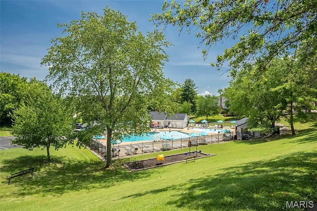 3644 Cinnamon Tree Ln, Oakville, MO 63129 - view of yard with a community pool