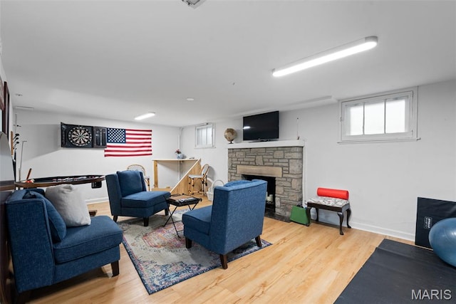9351 White Ave, Brentwood, MO 63144 - living room with wood finished floors and a fireplace