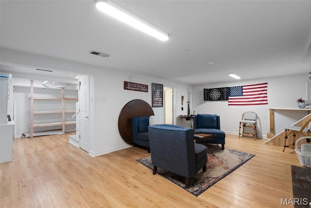 9351 White Ave, Brentwood, MO 63144 - living room featuring wood finished floors and baseboards