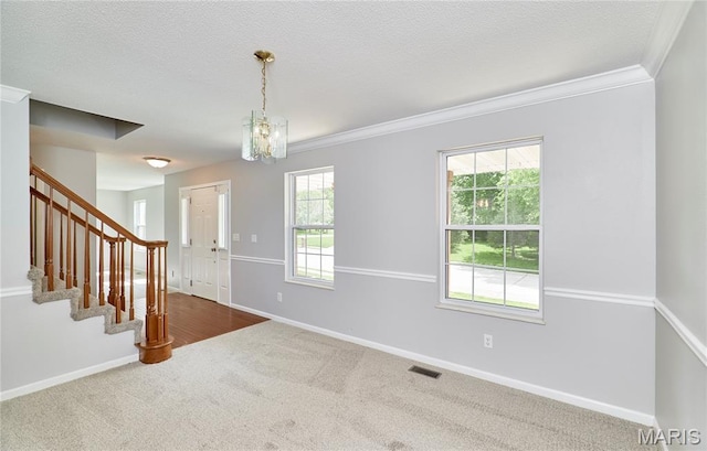 1583 Clarys Grv, Ofallon, IL 62269 - unfurnished room featuring carpet, stairway, ornamental molding, and baseboards