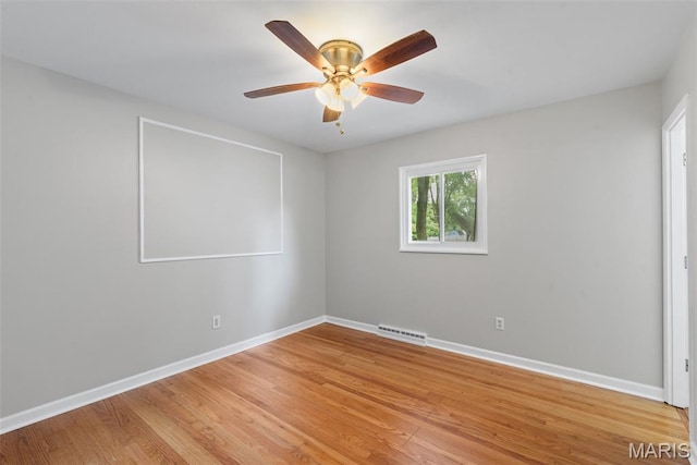 6714 Sandy Hill Dr, Hazelwood, MO 63042 - unfurnished room featuring baseboards, light wood-style floors, and ceiling fan